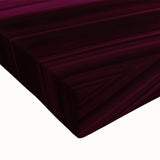 Close-up of a stretched canvas artwork depicting vibrant landscape canyons, showcasing rich colors and intricate details, ideal for home decor.