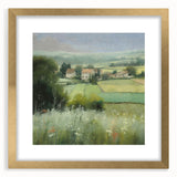 Framed landscape wall art depicting a serene countryside scene, featuring vibrant greens and soft gold accents, ideal for enhancing home decor with a touch of nature.