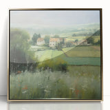 Framed acrylic wall art depicting a serene countryside landscape with rolling hills and lush greenery, accented by a gold frame, ideal for home decor.