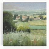 Stretched canvas wall art depicting a serene countryside landscape, featuring lush green fields, a bright blue sky, and soft white clouds. Perfect for home decor.