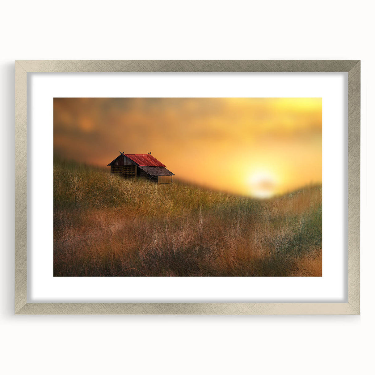 Silver-framed landscape artwork depicting a serene countryside scene, featuring vibrant colors and a white mat, ideal for enhancing home decor aesthetics.