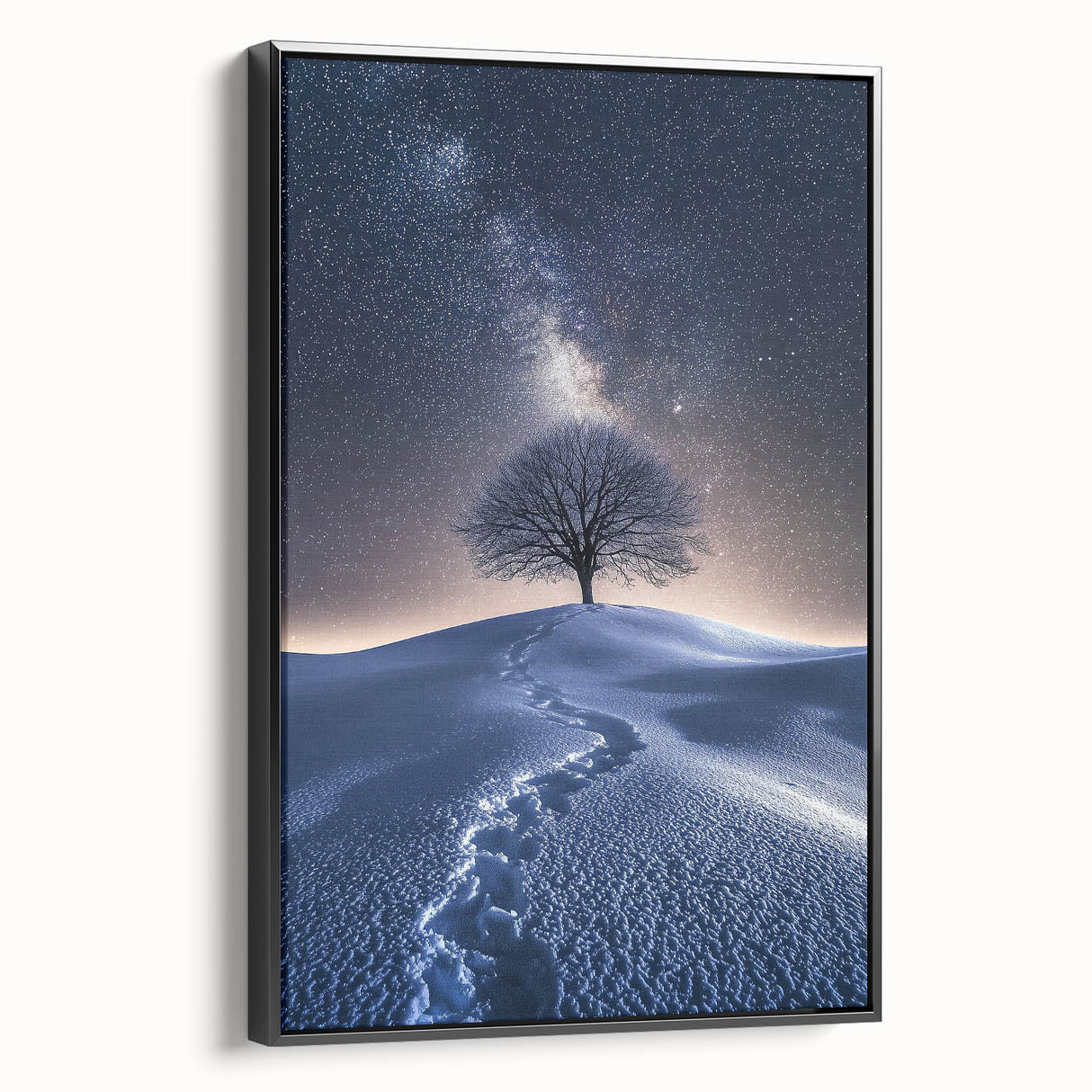 Framed canvas artwork depicting a stunning desert landscape with vibrant colors and intricate details, featuring a sleek black frame for an elegant presentation.