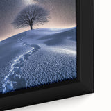 Close-up of a framed canvas artwork depicting a vibrant desert landscape with warm tones of orange and yellow, showcasing intricate details of the scenery and textures.