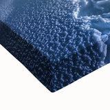 Close-up of a stretched canvas artwork depicting a vibrant desert landscape with warm tones of orange and yellow, showcasing intricate details and textures ideal for home decor.