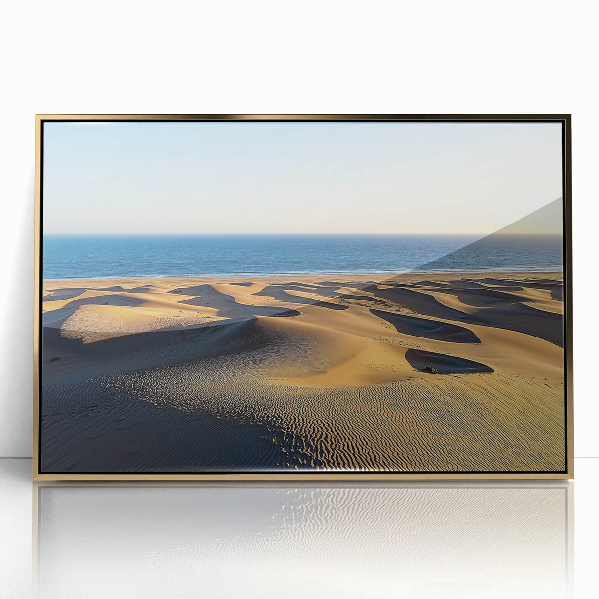 Framed acrylic artwork showcasing a serene desert landscape with rolling dunes and a golden hue, designed to enhance modern interiors with elegance and warmth.