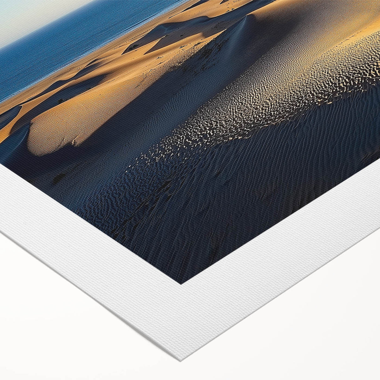 Rolled canvas print showcasing a vibrant desert landscape featuring golden sand dunes under a clear blue sky, designed to enhance any room's decor.