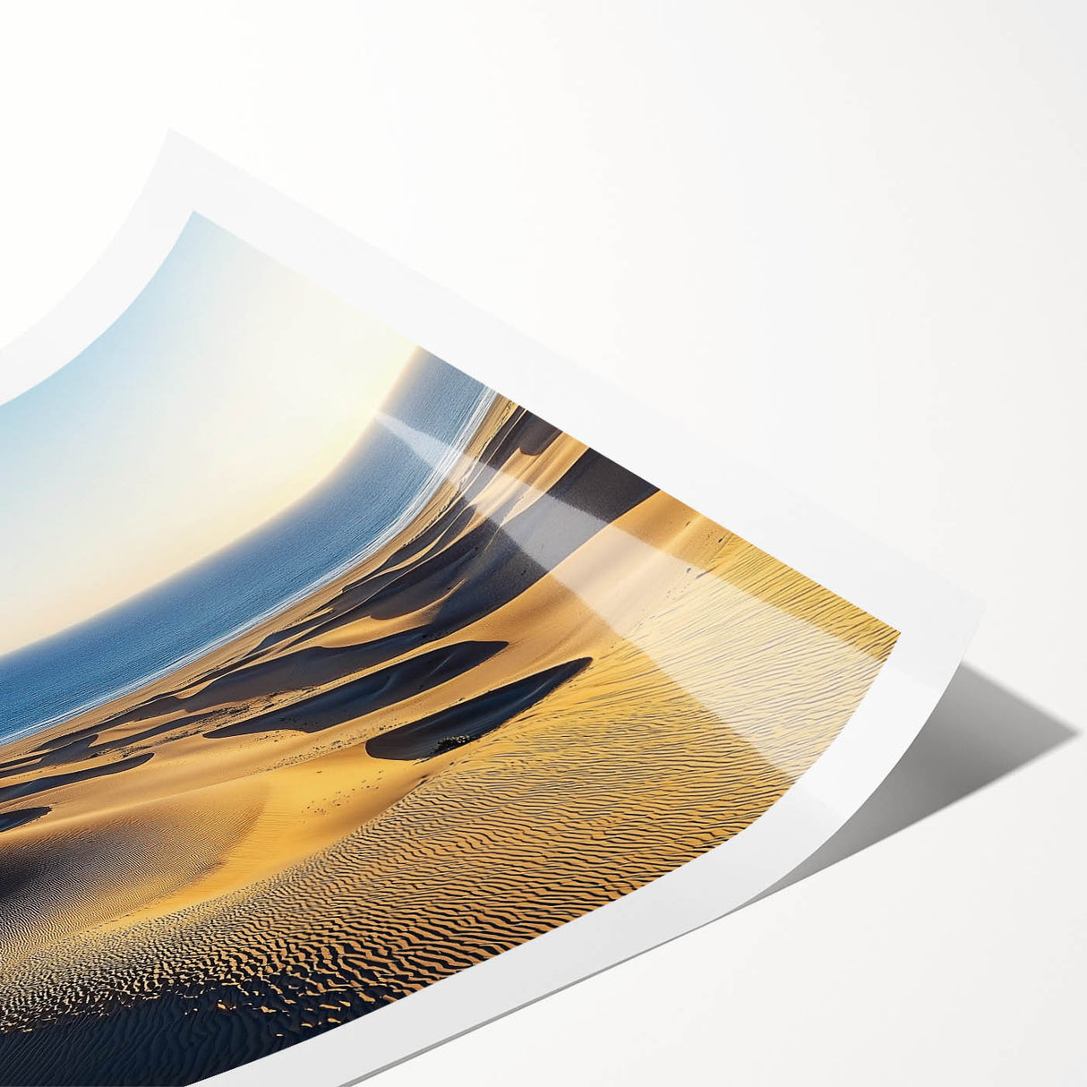 Rolled print of serene desert dunes landscape artwork, showcasing warm beige and golden tones, elegantly packaged in a protective cardboard tube for easy display.