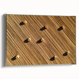 Framed canvas artwork of a vibrant landscape featuring lush green fields and a serene sky, presented in a sleek silver frame, perfect for modern home decor.