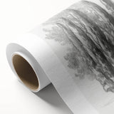 Rolled canvas showcasing a vibrant landscape design, featuring rich colors and intricate details, securely packaged in a durable cardboard tube for safe delivery.