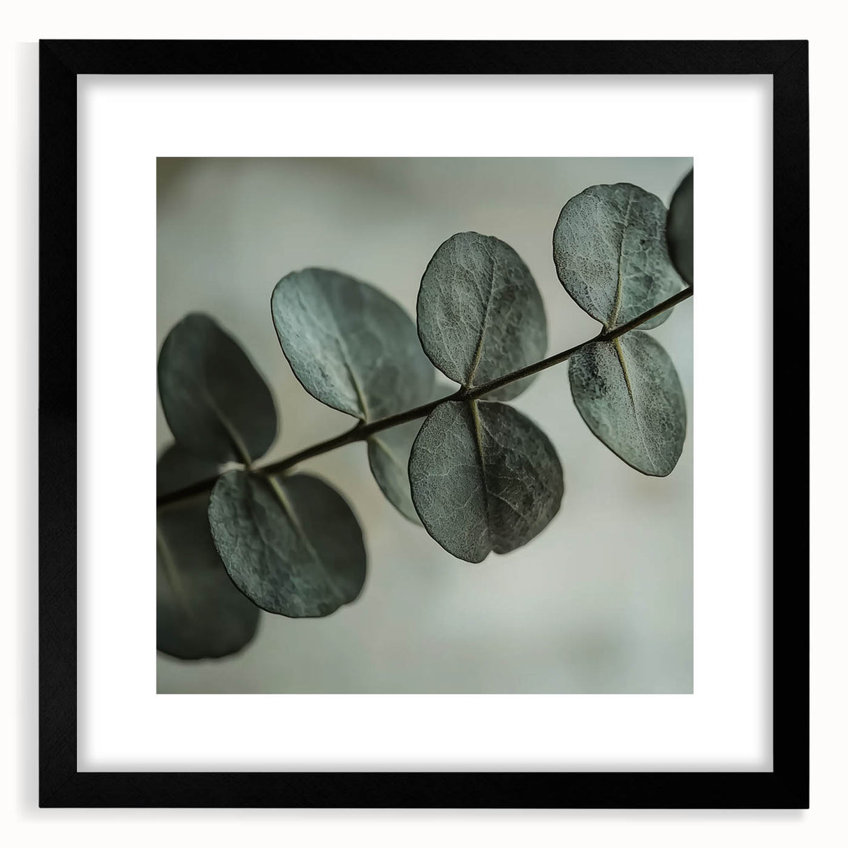 Extra large abstract art print of colorful, textured leaves, framed in black, ideal for living room decor.