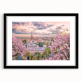 Colorful abstract art print of Paris scenery in vibrant hues on a large framed canvas, ideal for living room decor.