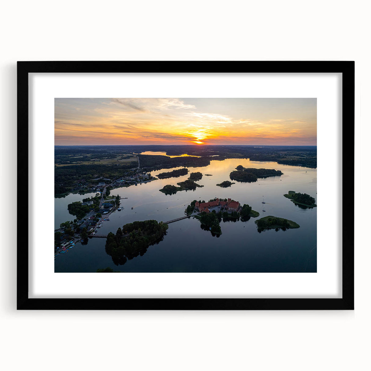Colorful abstract art print of a European scenery in Lithuania, with vibrant hues on a large framed canvas.