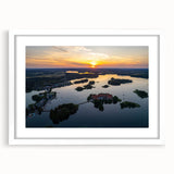 Textured abstract art print of a European Lithianian scenery in muted earth tones, framed with a white mat.