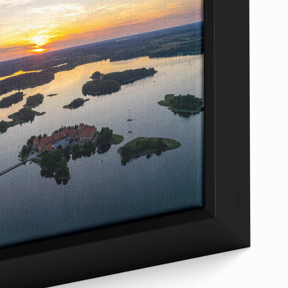 Black wall art featuring a textured depiction of a European Lithuanian scenery in vibrant colors on a framed canvas.