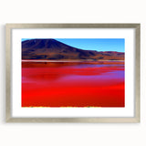 Textured abstract art print depicting a Bolivian landscape in earthy tones on a framed silver mat, ideal for bedroom art.