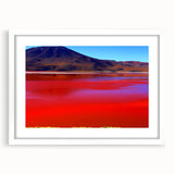 Abstract art print of a Bolivian landscape in muted earth tones on a framed white mat, ideal for dining room decor.