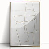 Framed minimalist wall art featuring an abstract design with gold accents, displayed against a white background, ideal for modern home decor.