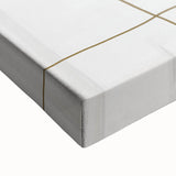 Close-up of a stretched canvas featuring an abstract minimalist design with soft beige and brown tones, perfect for modern home decor. This artwork adds a sophisticated touch to any living space or office.