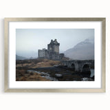 Elegant silver-framed landscape artwork featuring a majestic castle, complete with a white mat, showcasing intricate details and vibrant colors, perfect for home decor.