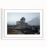 Elegant white-framed landscape artwork showcasing a majestic castle surrounded by lush greenery, perfect for enhancing home décor and adding sophistication to any room.