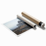 Rolled print showcasing a vibrant landscape featuring a majestic castle surrounded by lush greenery and a clear blue sky, ideal for home decor.