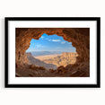 Black-framed landscape art piece featuring a cave scene, elegantly matted for enhanced depth, perfect for modern home decor. Ideal for nature enthusiasts.