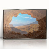 Framed acrylic artwork showcasing a stunning landscape scene with intricate caves and natural formations, highlighted by a silver frame, perfect for enhancing interior decor.