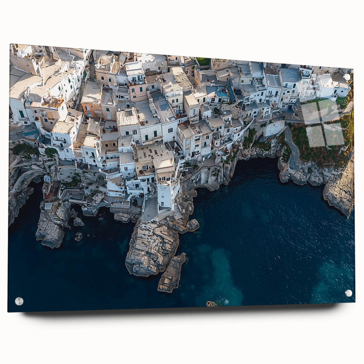 Acrylic landscape artwork depicting dramatic cliffs with vibrant colors, displayed in a sleek glass frame, showcasing depth and artistic detail. Ideal for modern home decor.