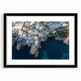Black-framed landscape artwork showcasing dramatic cliffs with a mat for added elegance. Ideal for home decor, this piece enhances any modern living space.