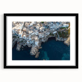 Black-framed landscape artwork showcasing dramatic cliffs with a mat for added elegance. Ideal for home decor, this piece enhances any modern living space.