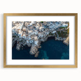 Framed landscape artwork showcasing dramatic cliffs with a gold mat, ideal for home decor. Captivating colors and textures enhance any living space.