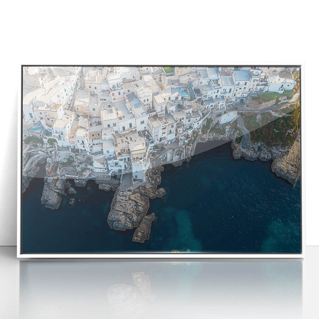 Framed acrylic artwork depicting a stunning landscape of cliffs against a vibrant sky, showcasing intricate details and vivid colors, perfect for modern home decor.