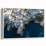Framed canvas artwork showcasing a serene landscape with dramatic cliffs, featuring soft colors of blue and beige, ideal for enhancing home decor in living spaces.