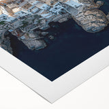 Stunning rolled canvas artwork showcasing a breathtaking landscape of cliffs and vibrant natural colors, elegantly packaged in a protective cardboard tube for easy display.