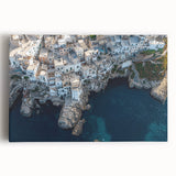 Stretched canvas artwork showcasing a breathtaking landscape of towering cliffs against a vibrant sunset, perfect for enhancing any modern home decor.