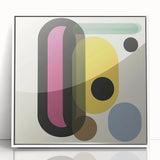 Framed acrylic artwork displaying an abstract geometric design with vibrant colors and bold shapes, set against a white background, ideal for modern decor.