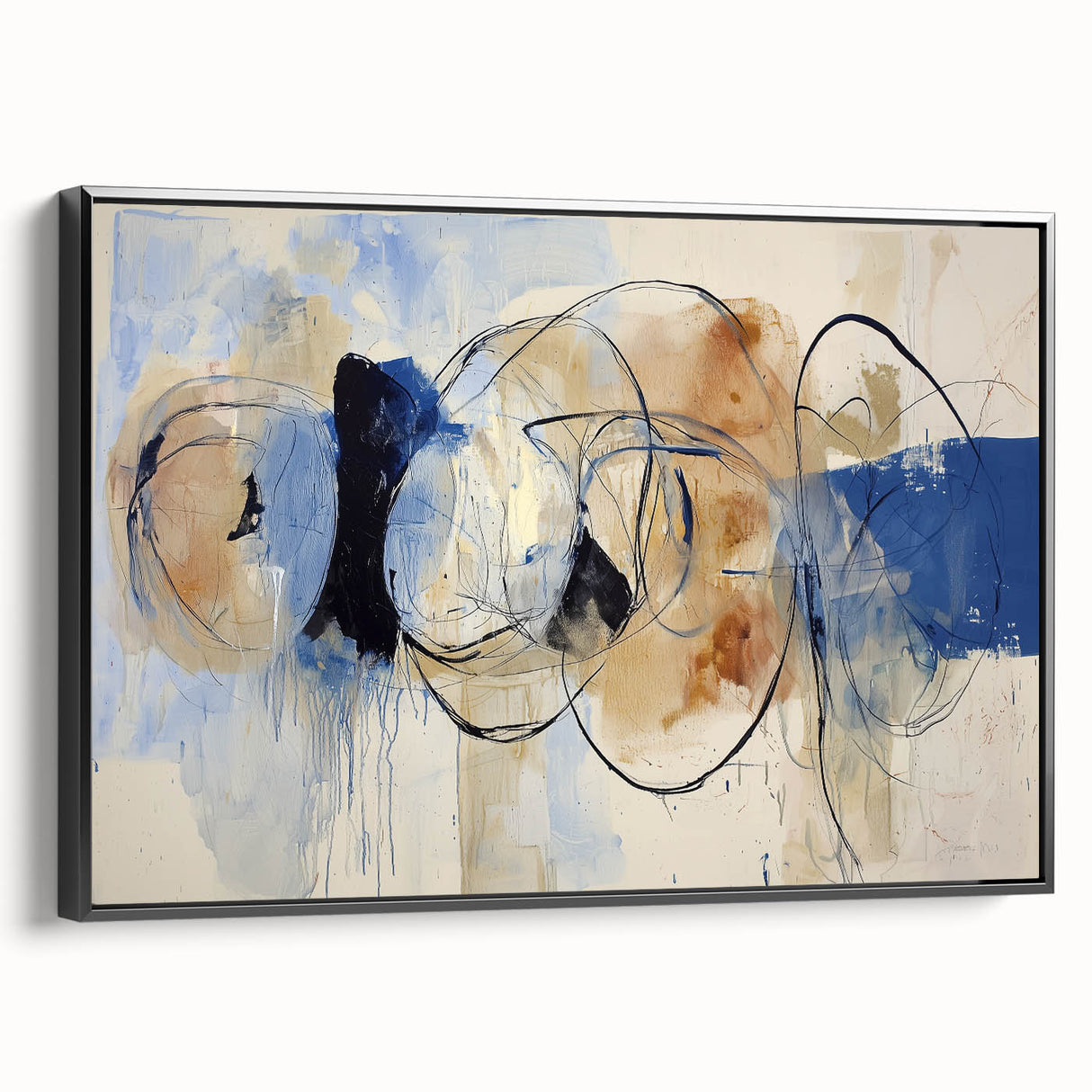 Framed canvas art displaying a modern abstract design with vibrant splatters in black and multicolor hues, showcasing a contemporary aesthetic perfect for any room.