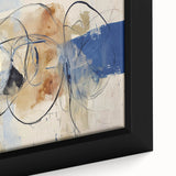 Close-up of a framed canvas print showcasing vibrant abstract splatters in bold colors, ideal for modern home decor. The artwork features dynamic textures and fluid designs, enhancing any interior space with a contemporary artistic flair.