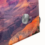 A close-up view of a vibrant acrylic landscape print showcasing stunning canyons in rich earth tones, highlighting intricate details and textures, ideal for modern home decor.