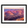 Black-framed landscape print of a canyon scene featuring warm earthy tones, elegantly matted for a polished look, ideal for enhancing home decor.