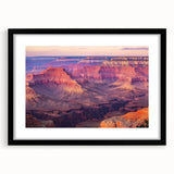 Black-framed landscape print of a canyon scene featuring warm earthy tones, elegantly matted for a polished look, ideal for enhancing home decor.