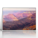 Framed acrylic artwork showcasing a stunning landscape of canyons, with vibrant colors and intricate details, set in a sleek white frame, ideal for modern decor.