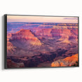 Framed landscape canvas depicting vibrant canyons in rich earthy tones, showcasing a black frame and side view details, perfect for home decor enthusiasts.