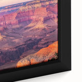 Framed canvas print showcasing a vibrant canyon landscape with rich colors and intricate details, ideal for home decor and nature lovers. Perfect for adding warmth and depth to any space.