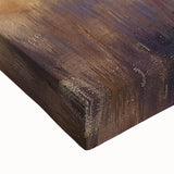 Close-up of a stretched canvas artwork depicting a serene countryside landscape, showcasing vibrant greens and tranquil skies, perfect for home decor.