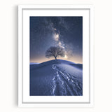 Desert landscape framed artwork with a white mat, showcasing vibrant hues of orange and yellow against a serene blue sky, perfect for modern home decor.