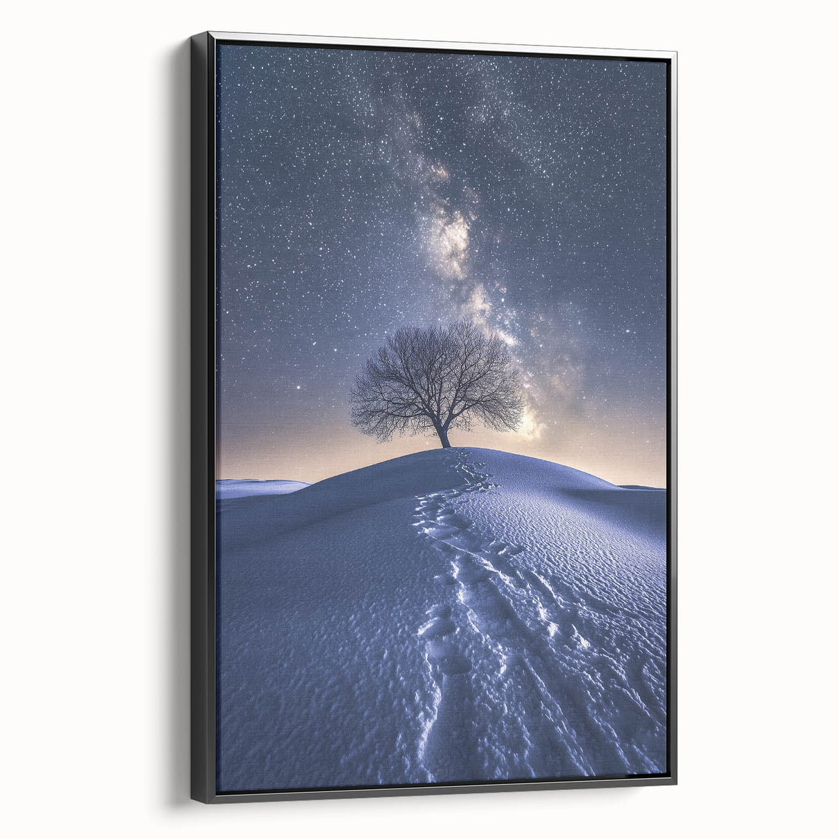 Framed canvas art depicting a vibrant desert landscape with warm hues of orange and yellow, showcased against a sleek black frame, perfect for modern home decor.