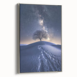 Framed canvas artwork depicting a serene desert landscape with vibrant colors, set in a sleek silver frame, ideal for modern home decor.