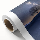 Desert landscape rolled canvas print showcasing vibrant hues of orange and yellow, featuring cacti and a dramatic sunset, ideal for home decor and art enthusiasts.