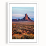 Framed landscape artwork depicting serene sand dunes in soft beige and white tones, showcasing a minimalistic design with a white mat, perfect for modern decor.